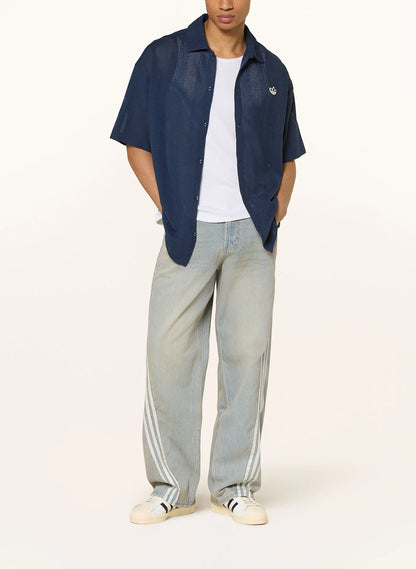 Adidas Originals
Camisa de manga corta para hombre SUMMER KNIT SHOOTING Comfort Fit en azul